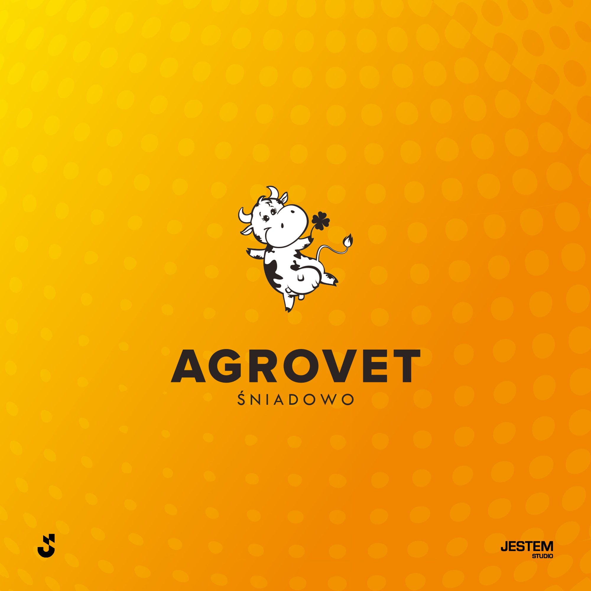 Logo Agrovet Śniadowo z maskotką krówki na żółto-pomarańczowym tle